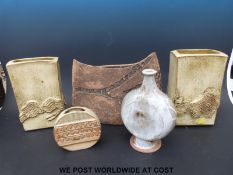 A collection of five earthenware studio pottery vases to include a large envelope shaped example