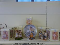 Sixteen boxed Leonardo Collection figures and a similar plate