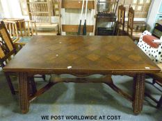 An oak extending dining table and nine chairs (minimum length of table 160cm, maximum 260,