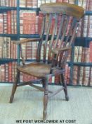 A 19thC elm seated Windsor chair