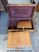 Three pieces of vintage leather luggage