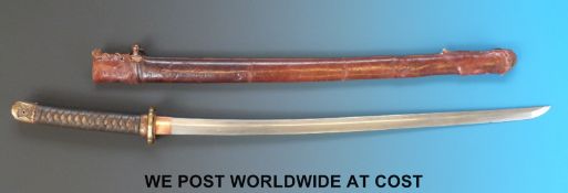 A Japanese Katana Shingunto sword, the early blade with clear visible Hamon.