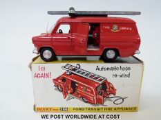 Dinky Toys diecast model Ford Transit Fire Appliance, 286, with red body and black retractable hose,