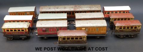 Twelve Hornby 0 gauge coaches including a set of four,