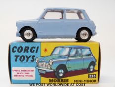 Corgi Toys diecast model Morris Mini-Minor, 226, with pale blue body, red interior and spun hubs,