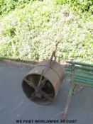 A large blacksmith-made hanging basket holder