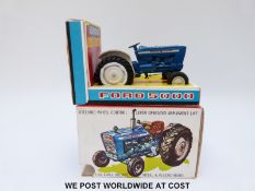 Britains Ltd diecast model Ford Super Major 5000 Diesel Tractor with blue body and white plastic