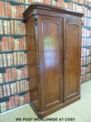 A Victorian mahogany compactum, the right hand side being hanging space,