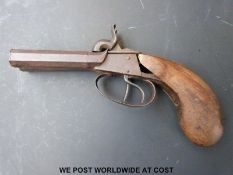 Double barrelled side by side hammer action pistol with stylised dolphin hammers and 3.