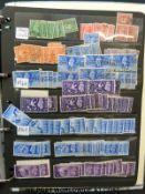 Two stockbooks of GB and regional issues including blocks and part sheets