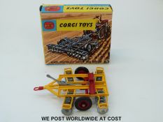 Corgi Toys diecast model Wheel Controlled Tandem Disc Harrow, 71, with yellow red and silver body,