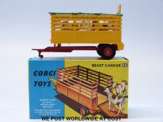 Corgi Toys diecast model Beast Carrier, 58, with yellow body, red chassis and hubs and four calves,
