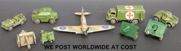 Nine Dinky Toys and Britains diecast model military vehicles and aircraft.