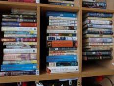 Approximately 45 military related first edition novels and titles on military subjects,