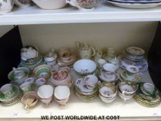 A large collection of part tea sets including Paragon 'Rockingham', Paragon 'May Blossom',