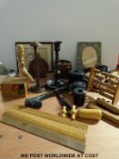 A collection of wooden items to include abacus, ruler, candlestick, ebonised pots, shillelagh,