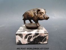A bronze model of a boar on marble plinth (height 8cm)