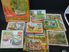 A large collection of children's jigsaw puzzles including Victory, Panda Puzzles,