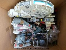 A large collection of Star Wars vehicles to include Millennium Falcon, Naboo Foam firing Blaster,