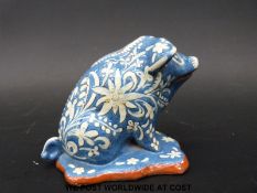 A 19thC pottery pig in slipware glaze,