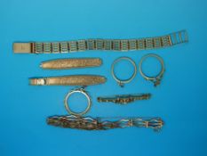 A yellow metal bracelet, 9ct gold watch strap, 9ct gold gate bracelet,