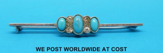 A 9ct white gold brooch set with diamonds and turquoise