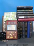A collection of framed coin collections, bank notes etc.