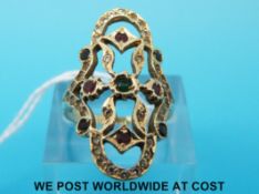 A 9ct gold ring set with rows of champagne coloured diamonds