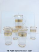 A retro glass lemonade set with gilt banding
