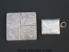 A white metal stamp case formed as an envelope together with a white metal four division pill or