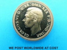 A 1937 proof gold full sovereign.