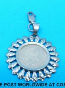 A 1/10 Krugerrand in 9ct gold mount,