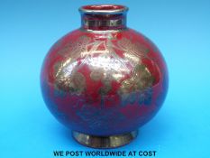 A Richard Ginori pedestal vase with floral silver lustre decoration against a red ground (13cm