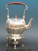 An Elkington & Co hallmarked silver spirit kettle and stand,