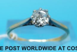 An 18ct gold ring set with an old cut diamond of approximately 0.