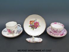 Two Meissen cups and saucers and a Meissen shop/slipper and a saucer