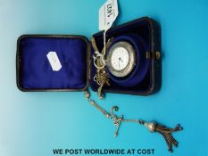 A Longines white metal cased pocket watch and intricate chain,