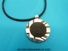 A silver pendant by Stephen Webster for Wedgwood depicting a bulldog 