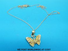 A 9ct gold necklace set with diamonds in the form of a butterfly (3.