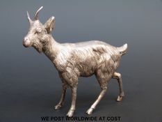 A hallmarked silver model of a goat, London 1978, maker's mark 'BSEP', length 9.