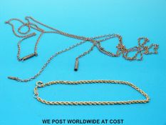 Two yellow metal necklaces and an 18ct gold bracelet