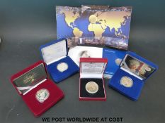 Six commemorative type silver crowns including a medal coin and two five pound examples