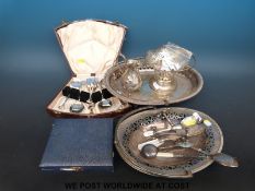 A quantity of silver plated ware to include swing handled baskets,