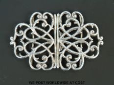 A George V hallmarked silver nurses belt buckle, Ldn 1911,