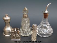 A hallmarked mounted Mappin & Webb pepper grinder,