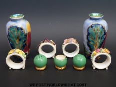 A set of Royal Doulton florally decorated napkin rings,