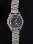 Cyma gentleman's military wristwatch with subsidiary dial on black face,
