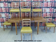 A Waring & Gilllow Ltd Art Deco burr walnut table and six chairs (5 + 1) with tapering octagonal