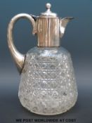 A Victorian hallmarked silver mounted hobnail cut claret jug,