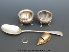 A Georgian hallmarked silver spoon and two salts,